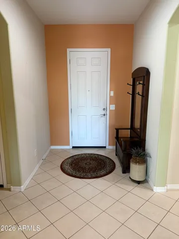 a view of sink and mirror