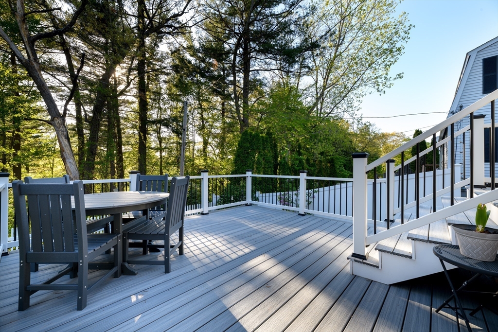 32 Westview Road Worcester, MA 01602 - Photo 18 of 18 a view of a dinning table and chairs on the roof deck