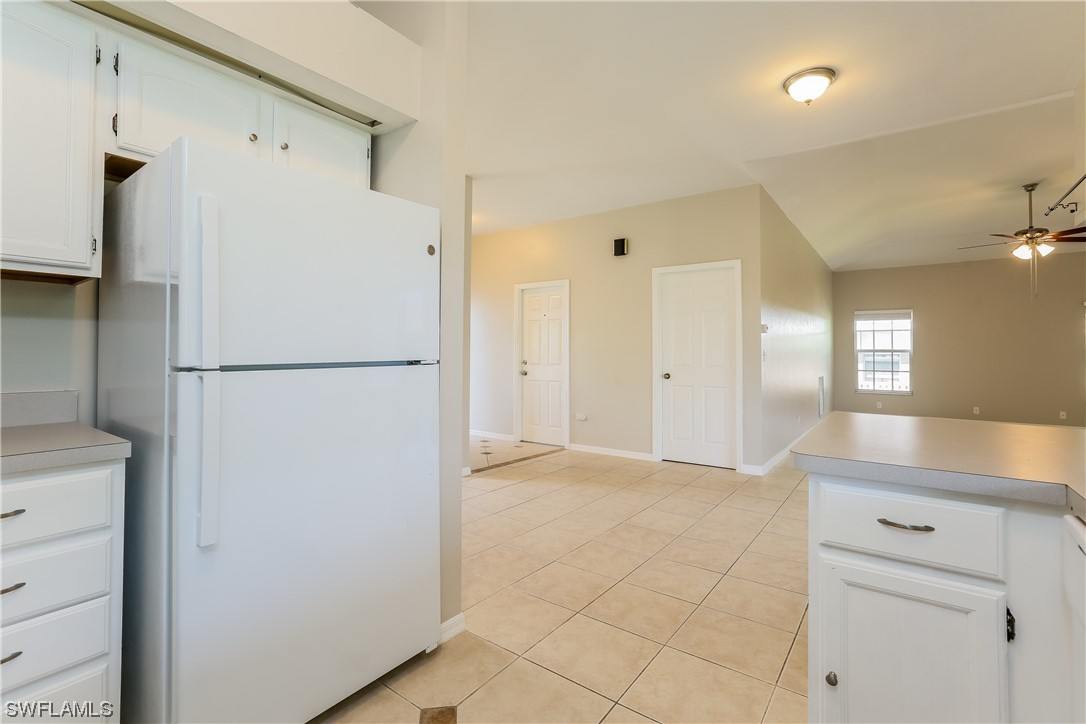 8373 Butternut Road Fort Myers, FL 33967 - Photo 5 of 13 a view of kitchen with a refrigerator cabinets and a dishwasher