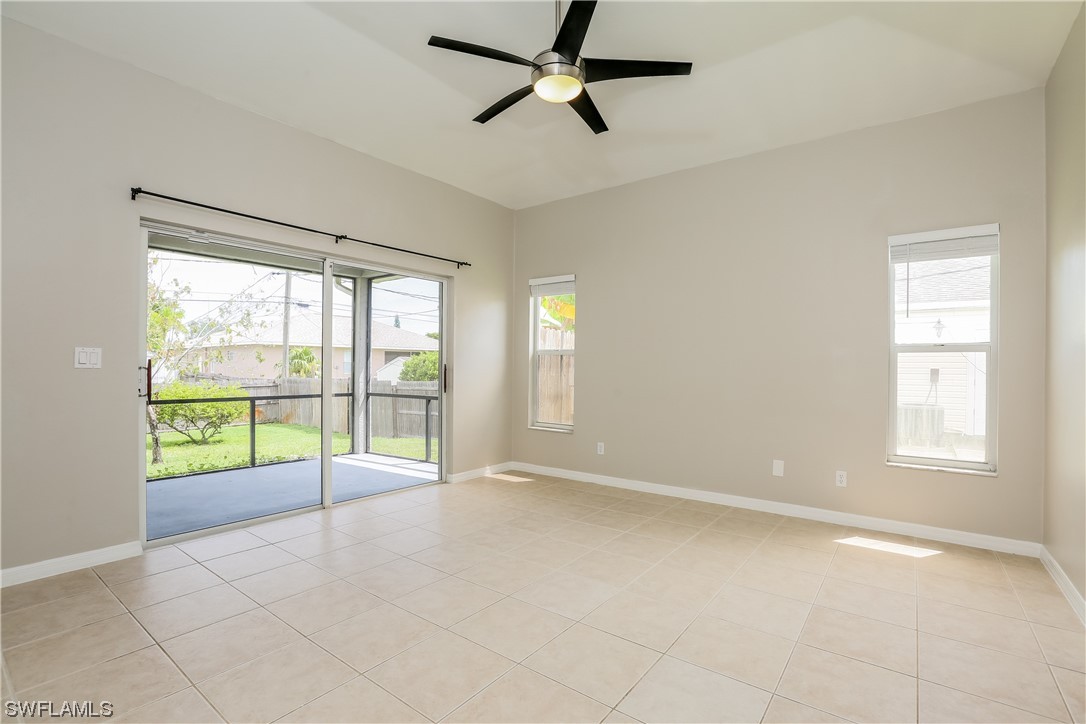 8373 Butternut Road Fort Myers, FL 33967 - Photo 7 of 13 a view of an empty room with a window