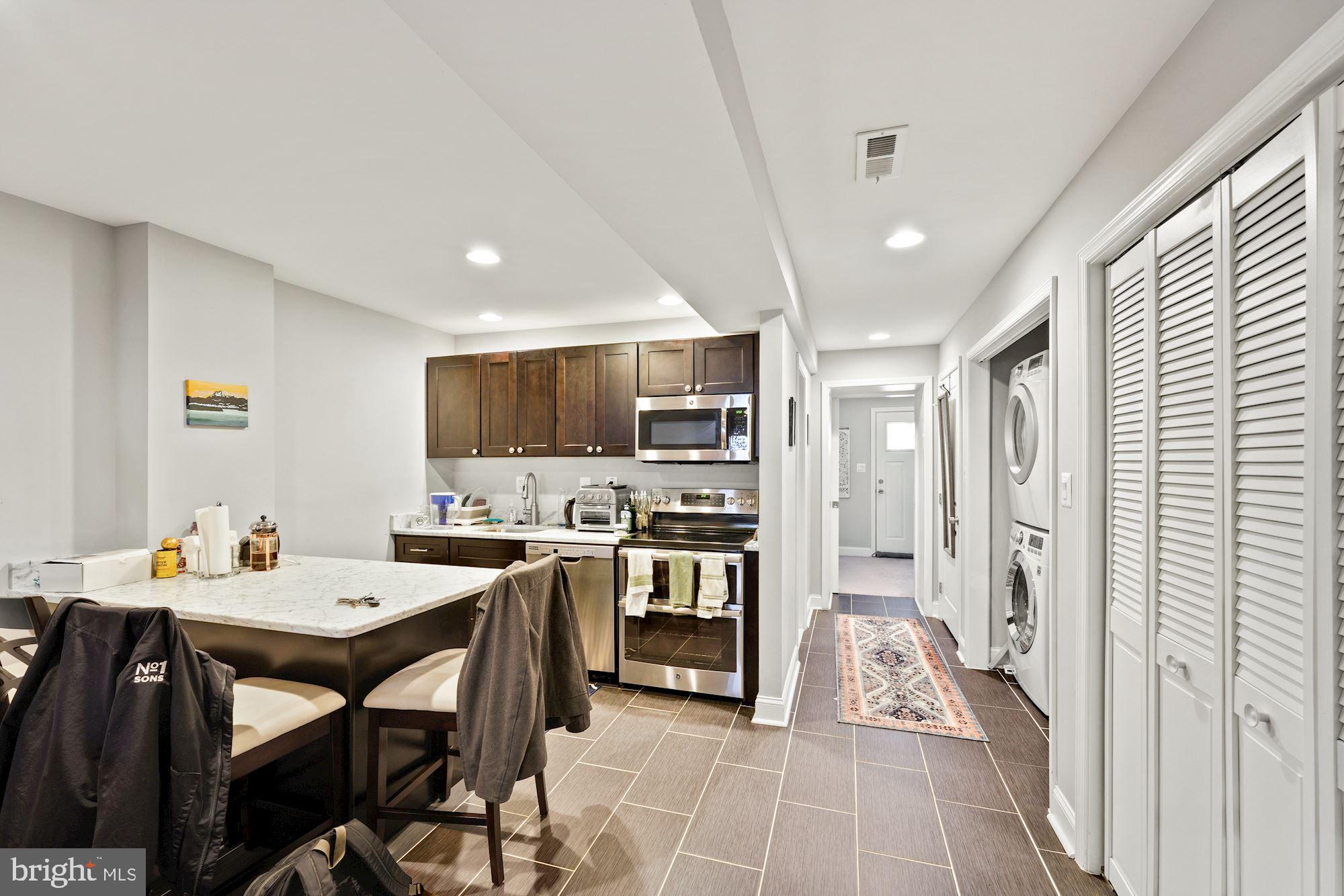 225 Channing Street Northeast Washington, DC 20002 - Photo 21 of 28 Full Kitchen and Island with Breakfast Bar
