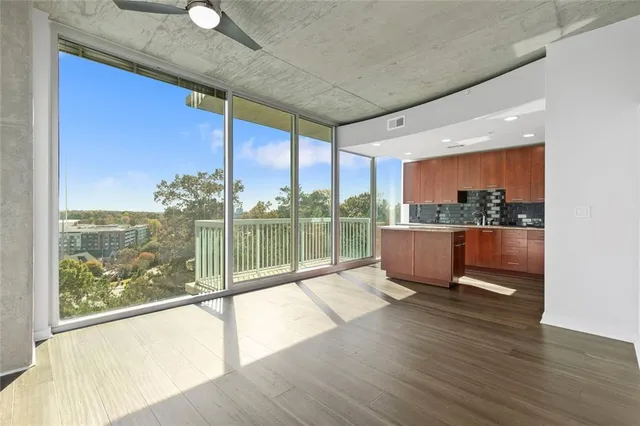 a bedroom with a large bed and a couch