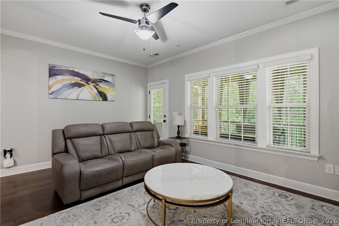 148 Heatherspring Way Spring Lake, NC 28390 - Photo 16 of 50 a living room with furniture and a large window