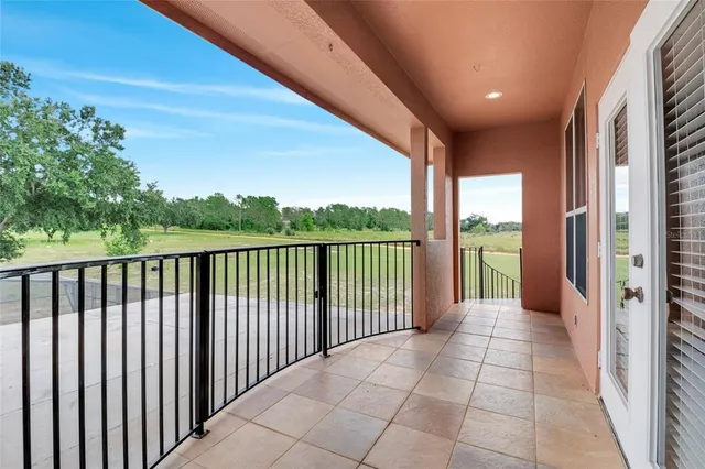 a view of a swimming pool with an ocean view