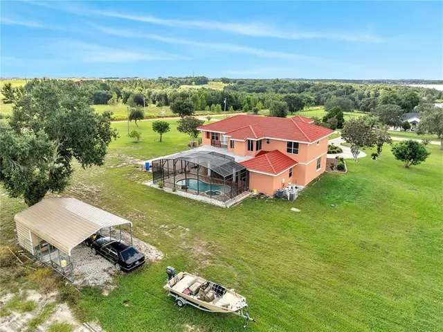 $995,000 | 18147 Coralwood Lane, Groveland, FL 34736