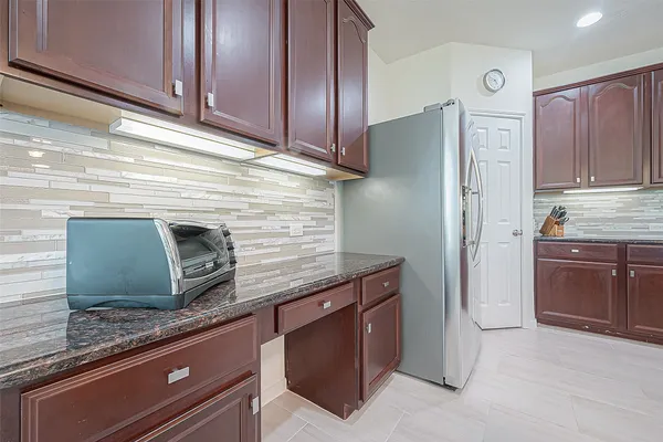 a dining room with furniture window and wooden floor