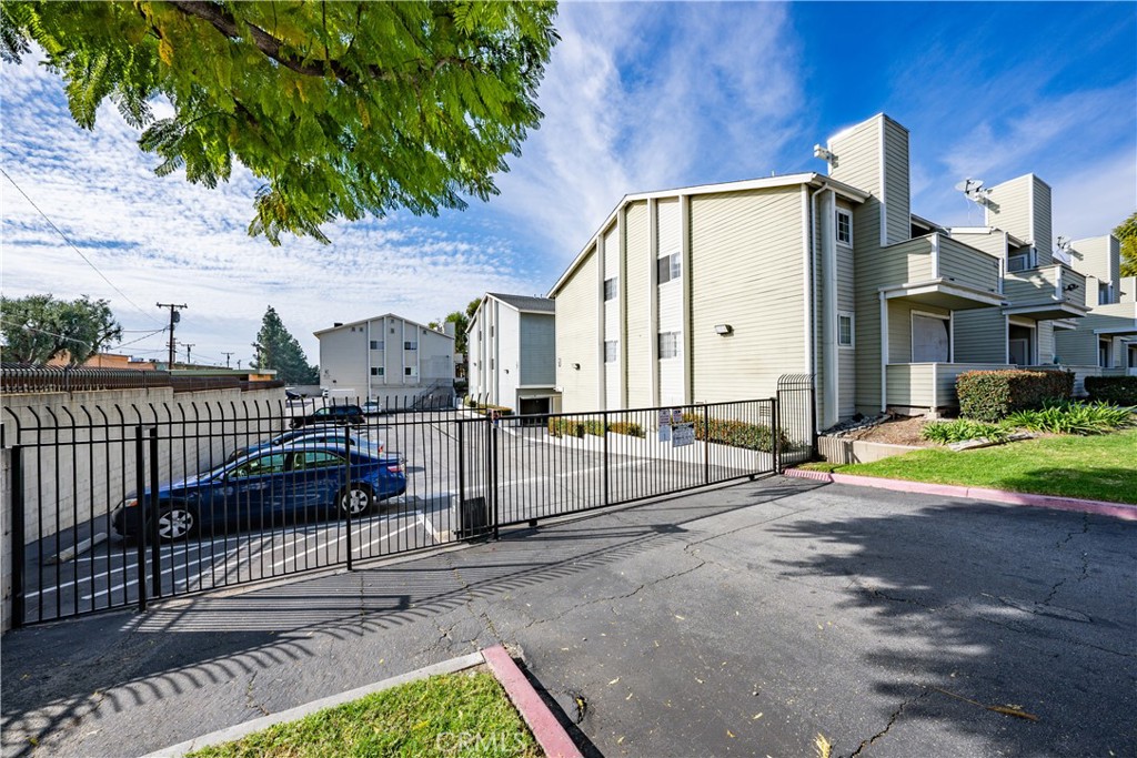 777 South Citrus Avenue Azusa, CA 91702 - Photo 1 of 1 a view of a street with wooden fence