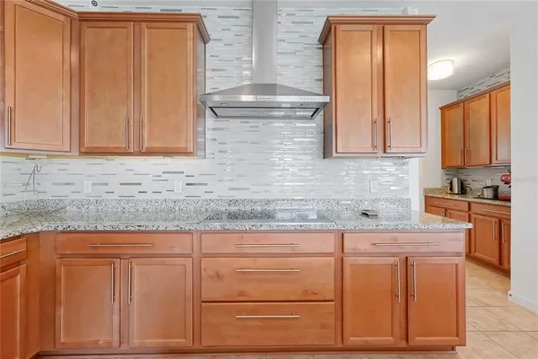 a bathroom with a sink mirror toilet and shower