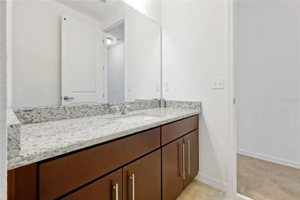 an aerial view of a swimming pool and lake view