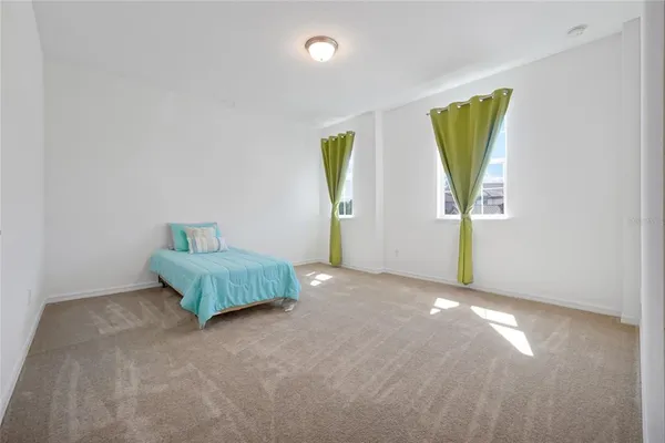 an aerial view of a house with a ocean view