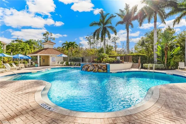 a view of a house with swimming pool