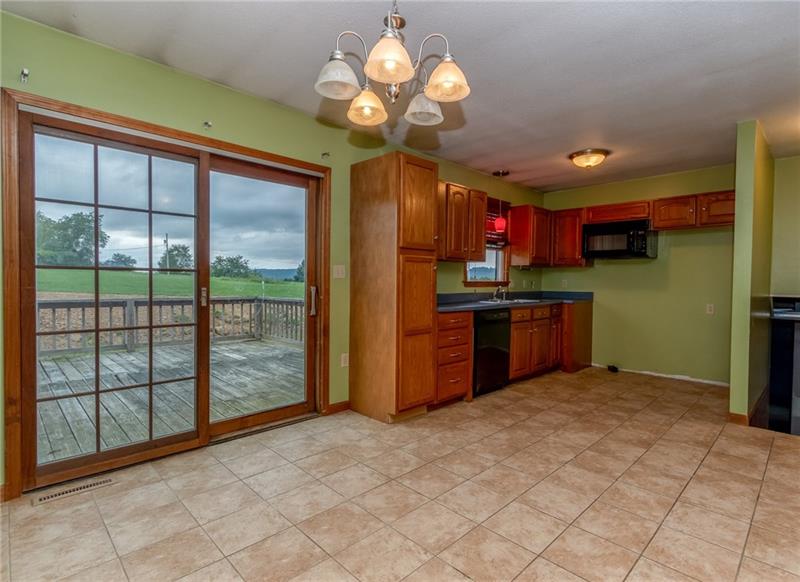275 Cowpath Road Aliquippa, PA 15001 - Photo 4 of 24 Eat In Kitchen Area with sliders to deck and lovely view.
