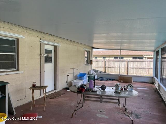 2305 Dairy Road Melbourne, FL 32901 - Photo 14 of 21 a living room with furniture and a window