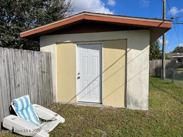 2305 Dairy Road Melbourne, FL 32901 - Photo 19 of 21 a backyard of a house with table and chairs