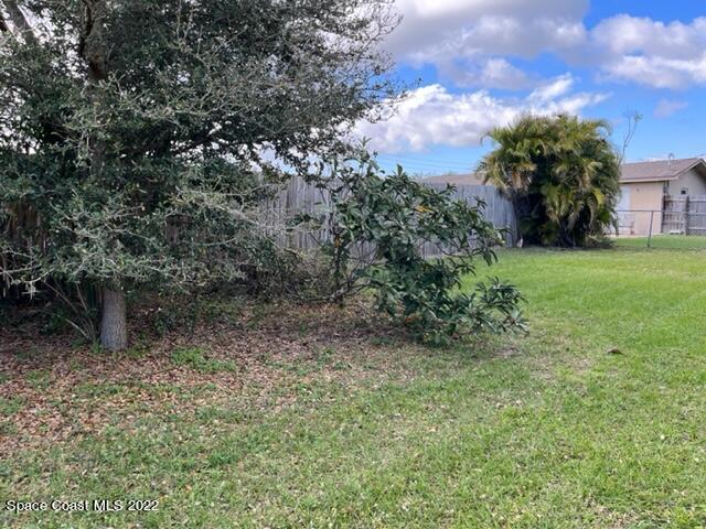 2305 Dairy Road Melbourne, FL 32901 - Photo 21 of 21 a view of a big yard with plants and large trees