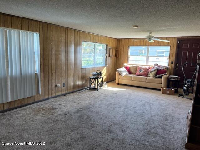 2305 Dairy Road Melbourne, FL 32901 - Photo 7 of 21 a living room with furniture and a window