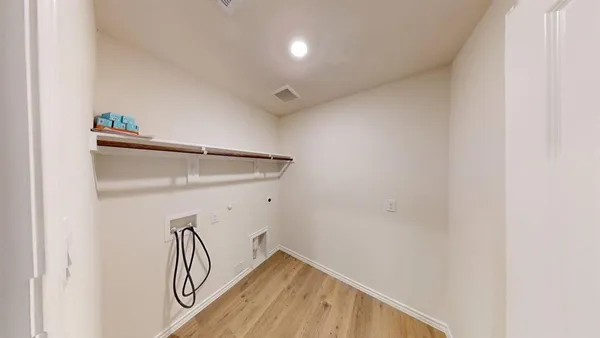 a view of a room with rack on the wall