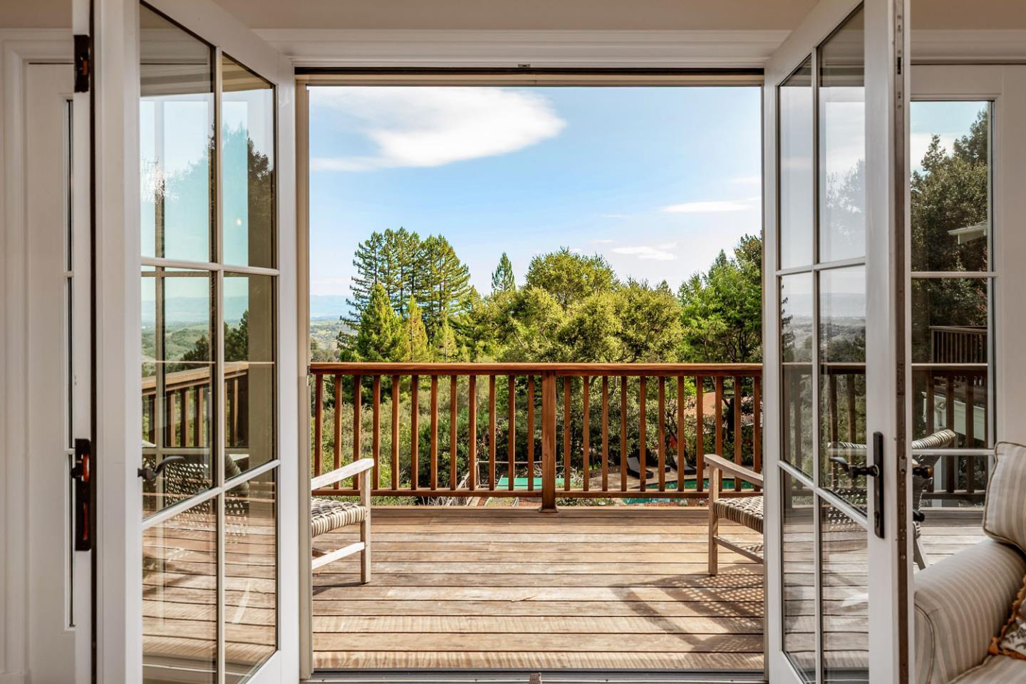 950 Espinosa Road Woodside, CA 94062 - Photo 14 of 24 a view of a balcony with floor to ceiling window