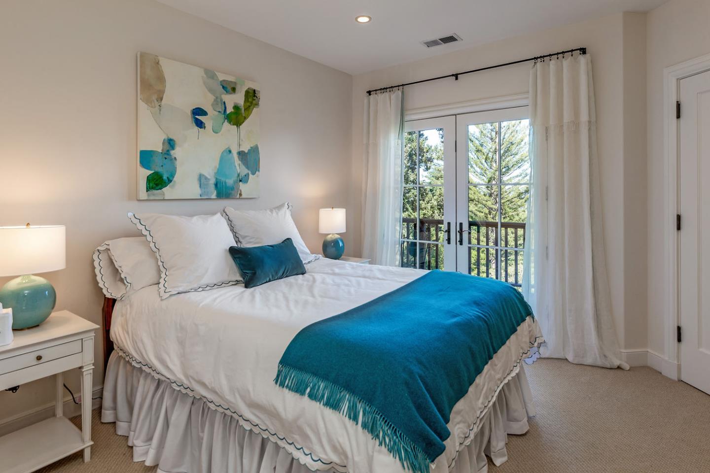 950 Espinosa Road Woodside, CA 94062 - Photo 19 of 24 a bedroom with a bed and a window