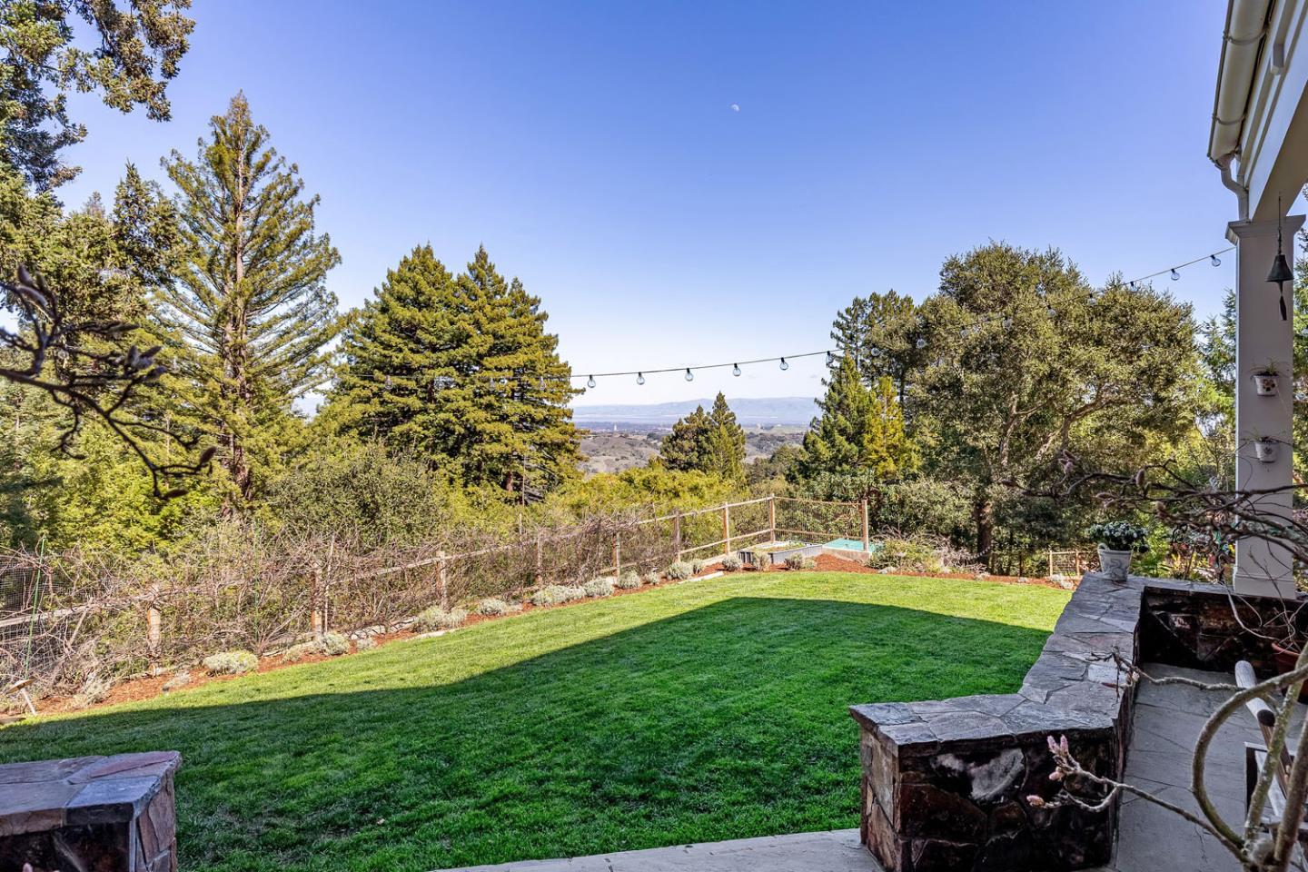 950 Espinosa Road Woodside, CA 94062 - Photo 21 of 24 a view of a golf course with a garden