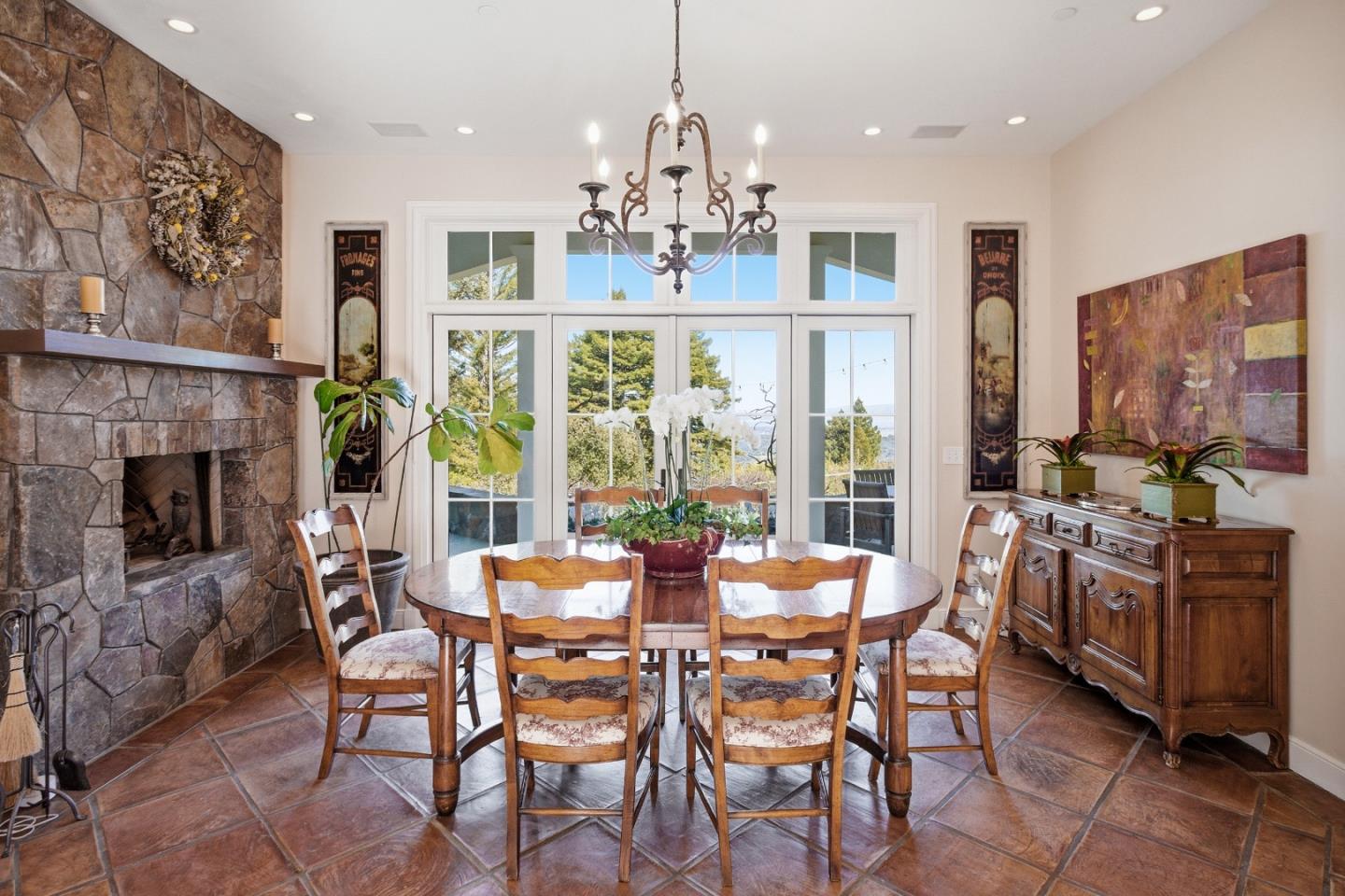 950 Espinosa Road Woodside, CA 94062 - Photo 5 of 24 a view of a dining room with furniture window and wooden floor