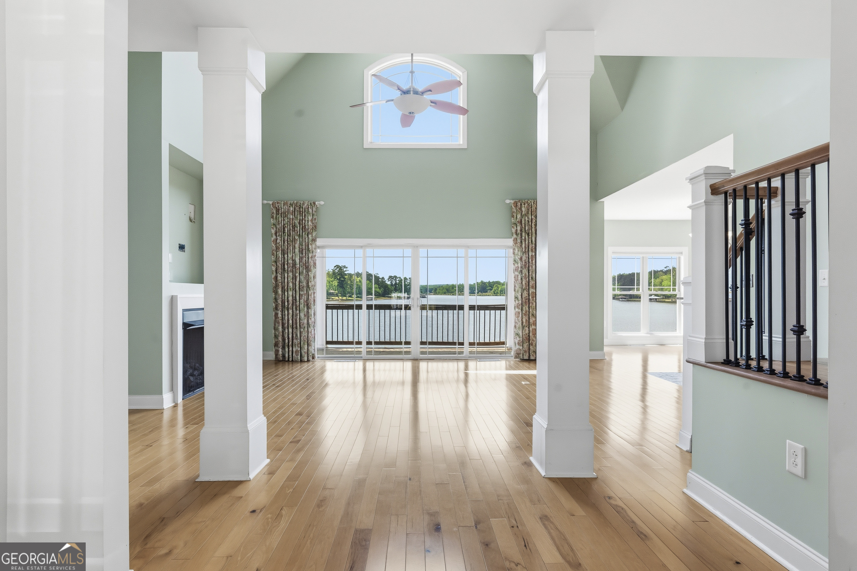 1038 Dennis Station Road Southwest Eatonton, GA 31024 - Photo 18 of 72 a view of a room with wooden floor and large window