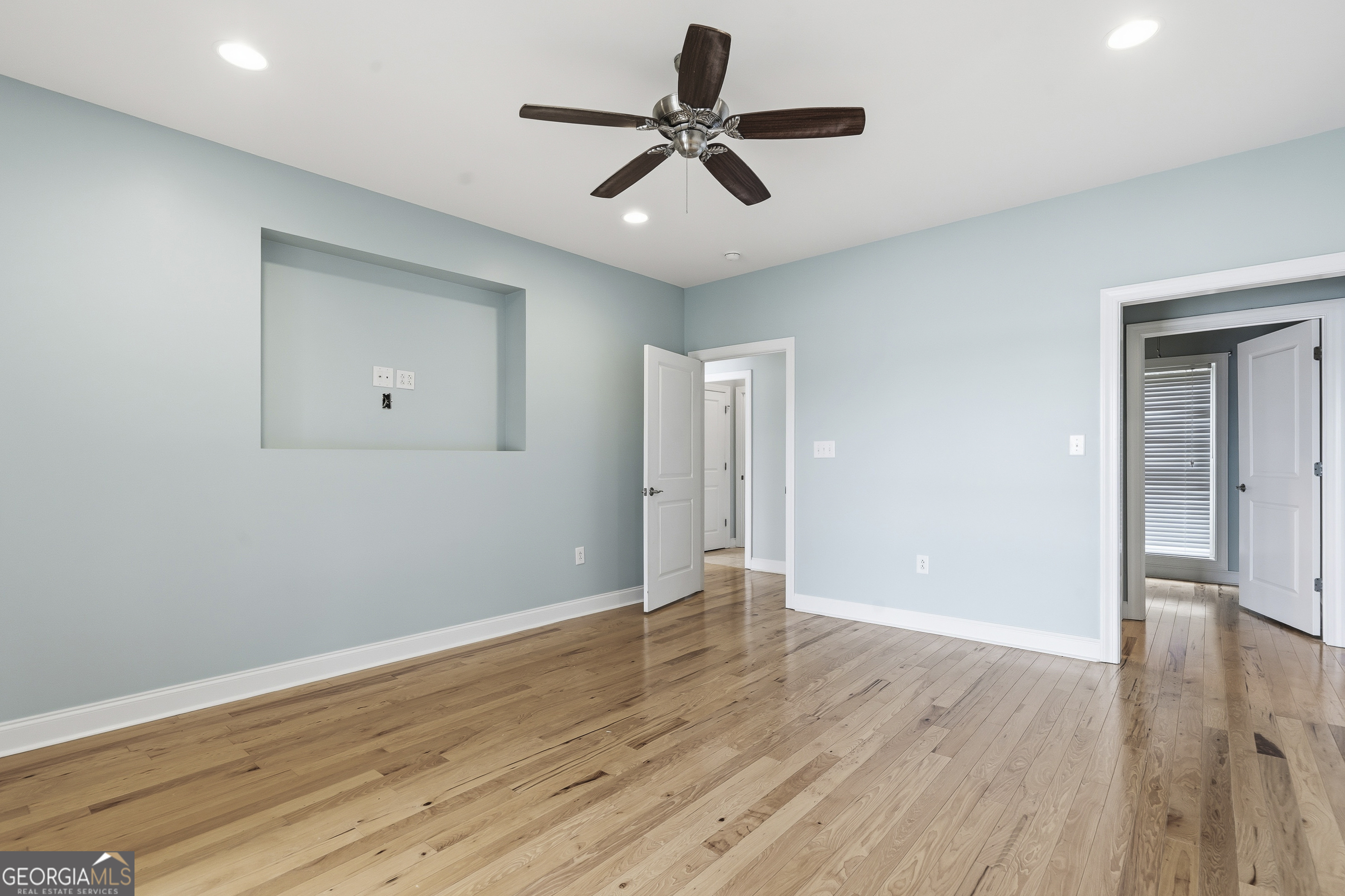 1038 Dennis Station Road Southwest Eatonton, GA 31024 - Photo 40 of 72 a view of an empty room with wooden floor