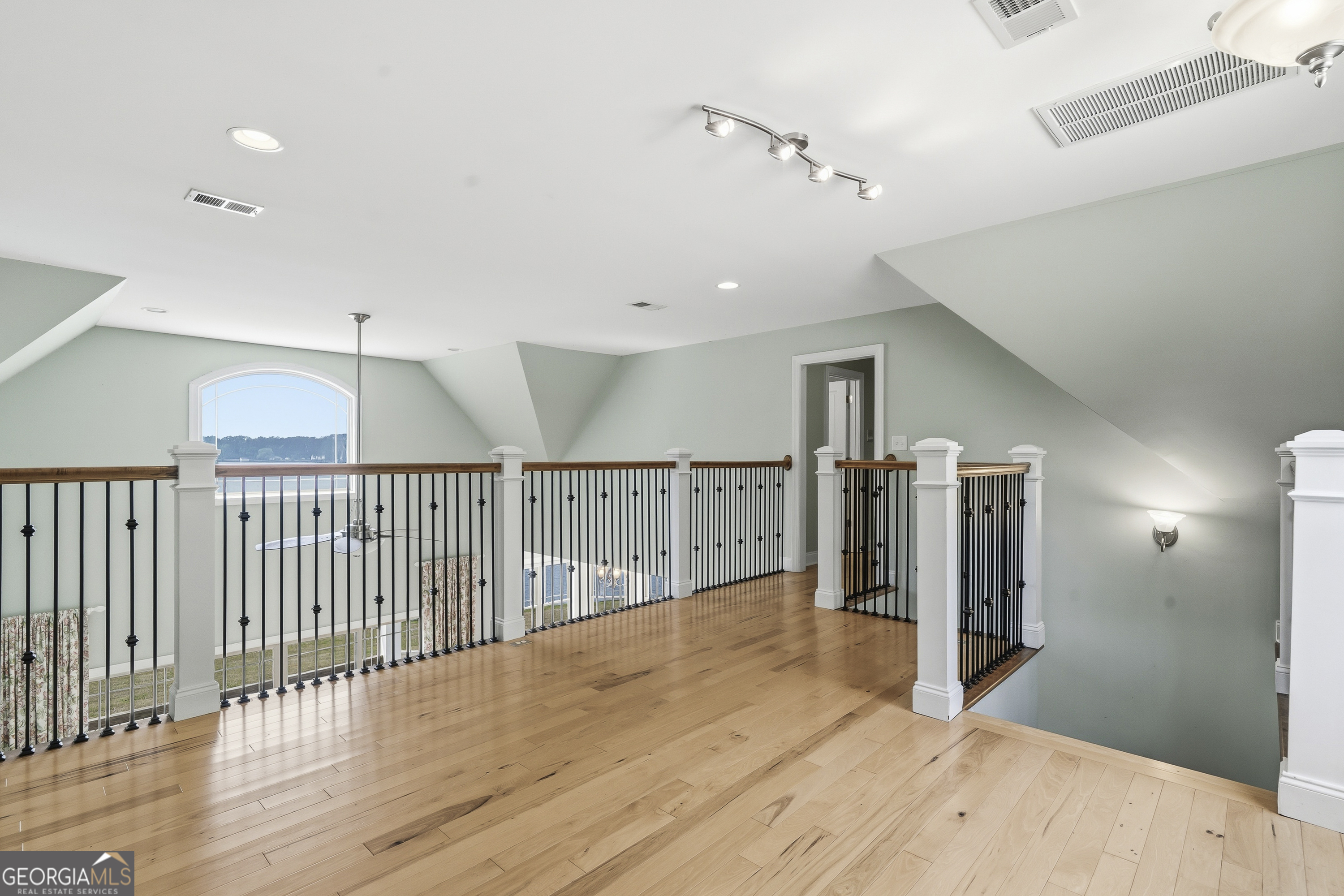 1038 Dennis Station Road Southwest Eatonton, GA 31024 - Photo 48 of 72 a view of a hallway with wooden floor