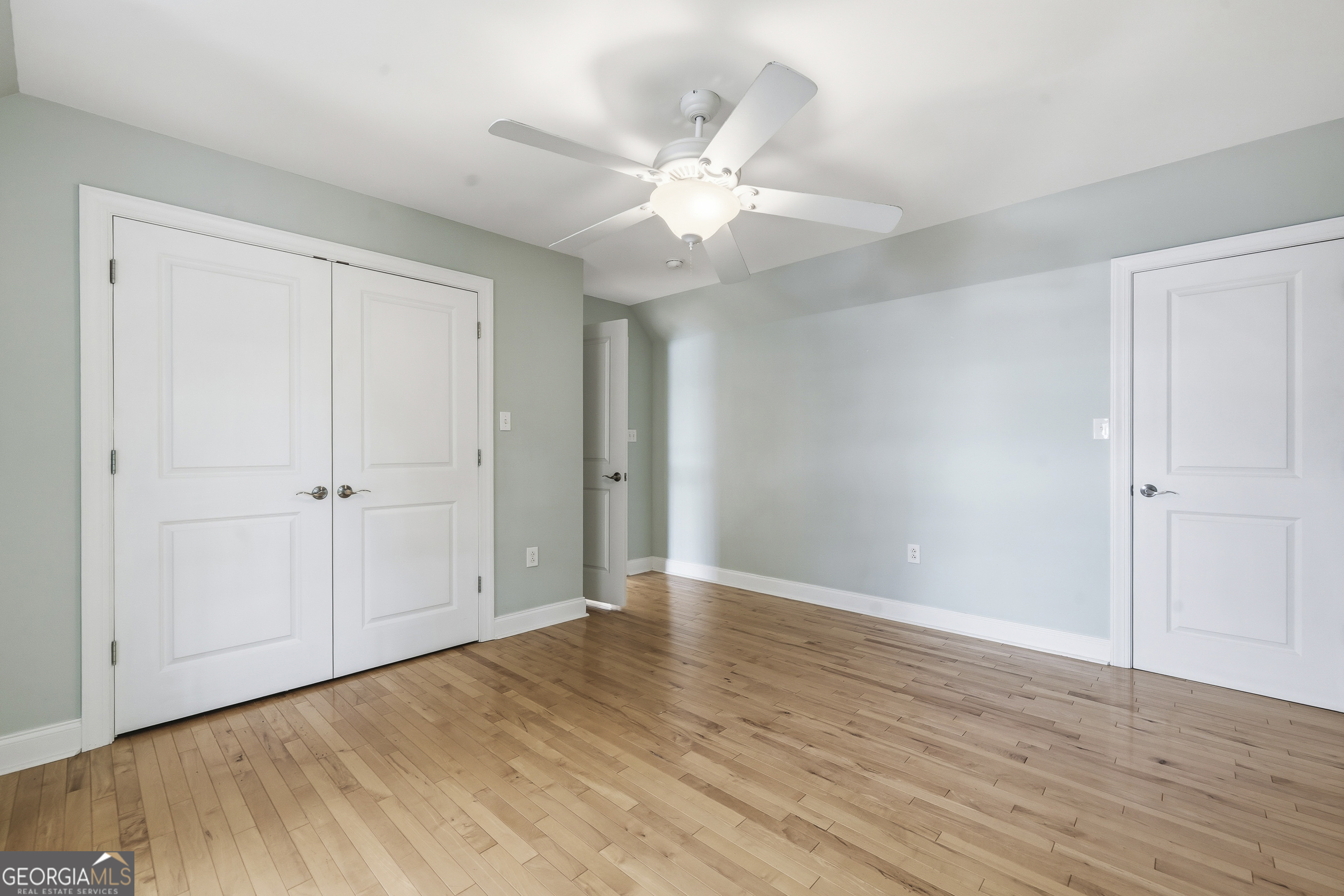 1038 Dennis Station Road Southwest Eatonton, GA 31024 - Photo 51 of 72 a view of an empty room with wooden floor