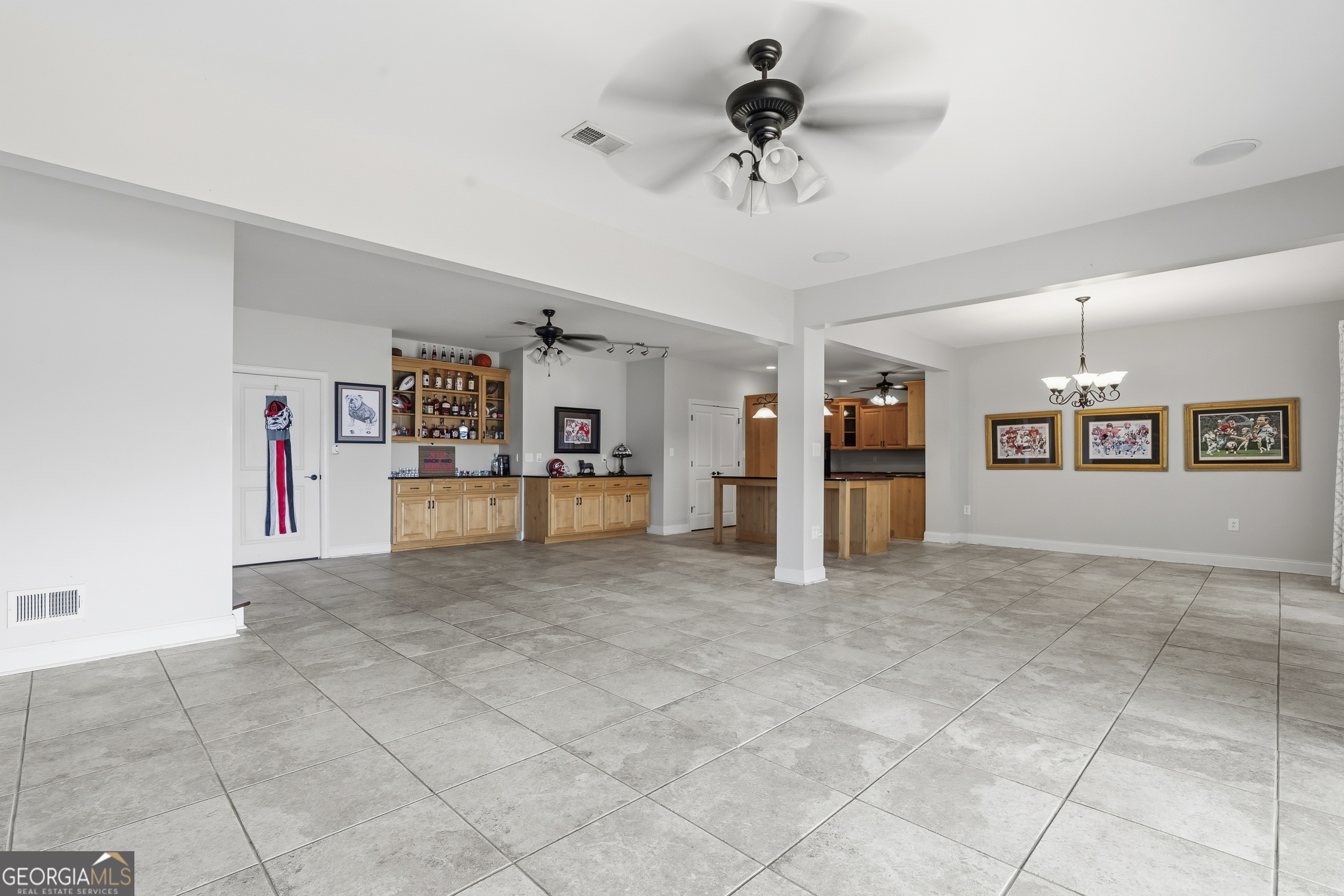 1038 Dennis Station Road Southwest Eatonton, GA 31024 - Photo 69 of 72 a view of a livingroom with a ceiling fan