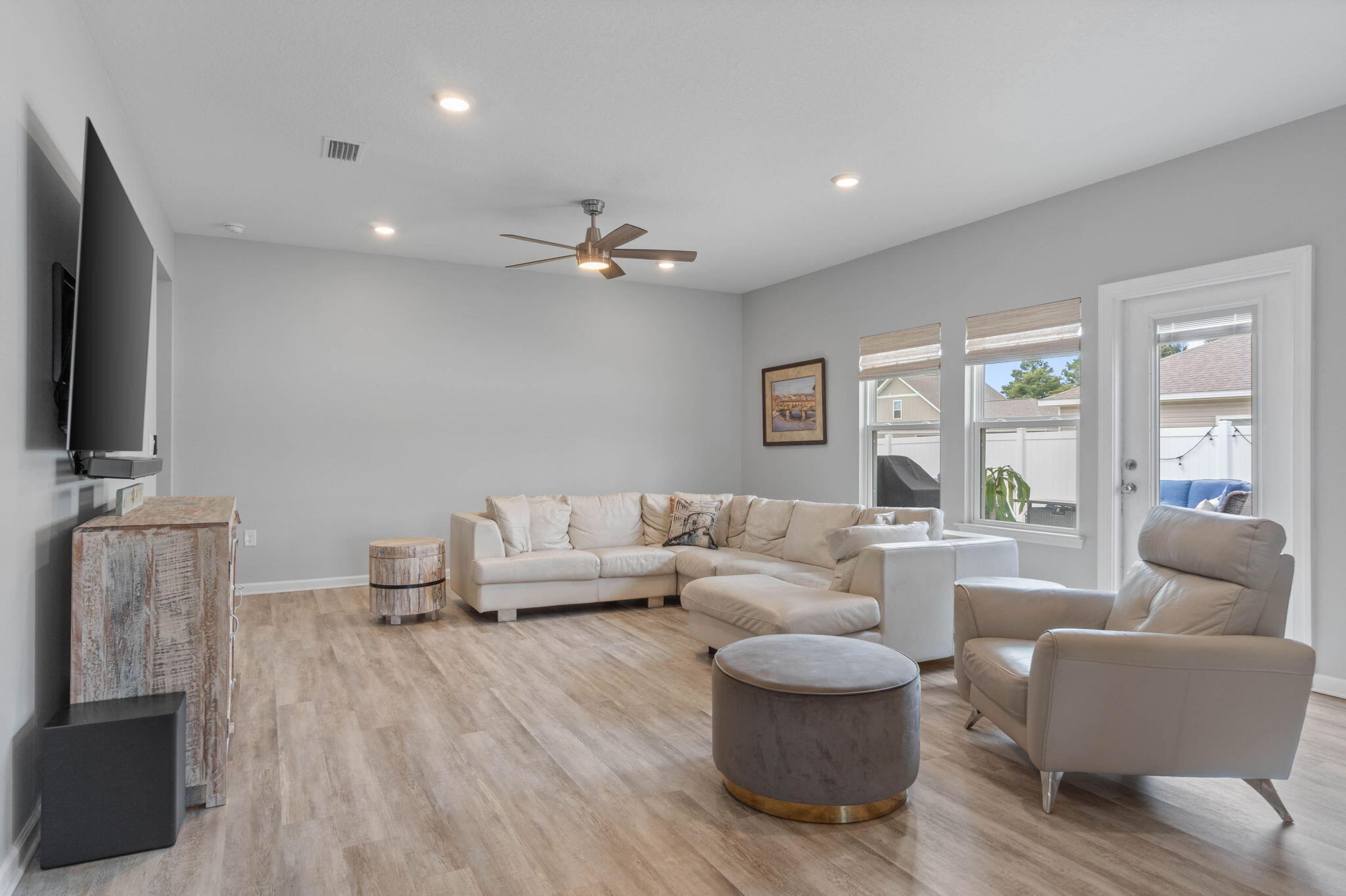 38 Silverthorn Street Freeport, FL 32439 - Photo 15 of 42 a living room with furniture and a flat screen tv