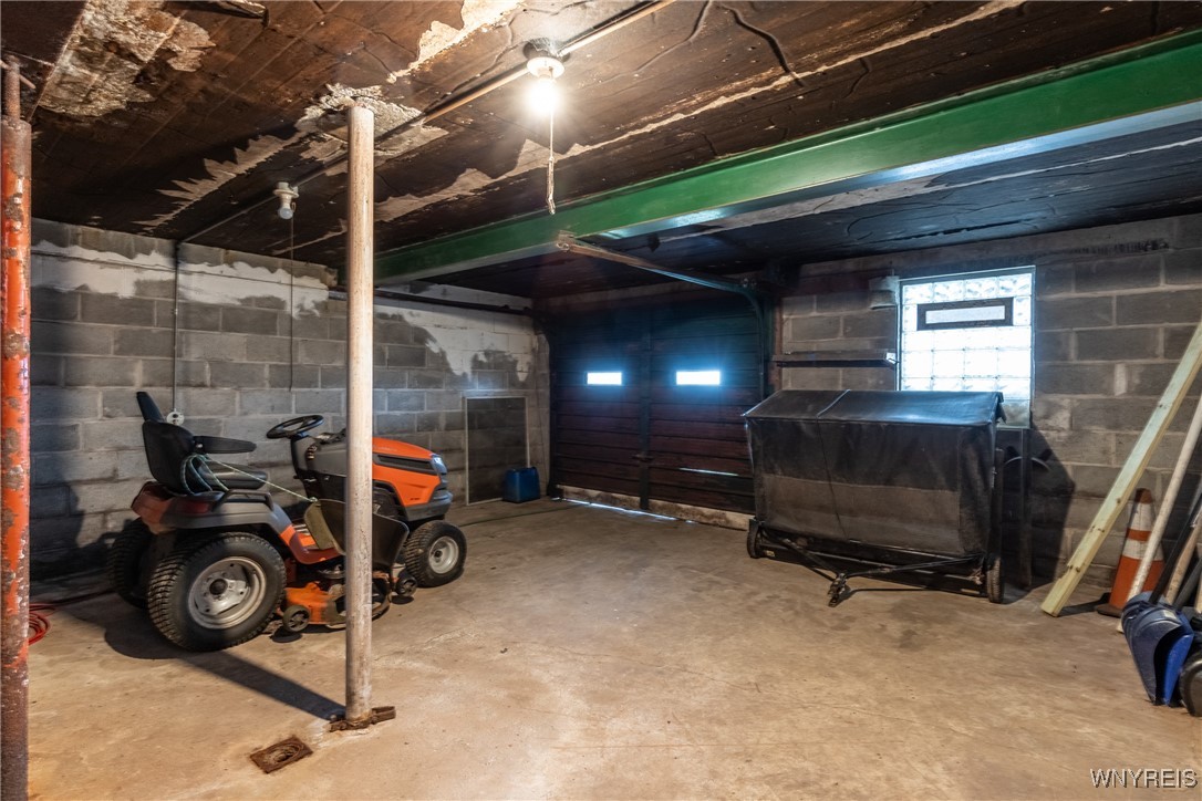 7094 Bear Ridge Road Pendleton, NY 14120 - Photo 33 of 38 Lower walkout garage