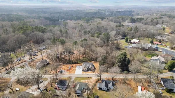 a view of swimming pool with a yard