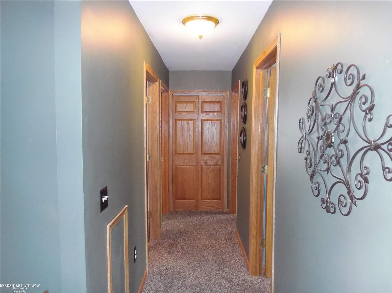 12225 Dunn Road Memphis, MI 48041 - Photo 29 of 46 hallway to upper bdrms