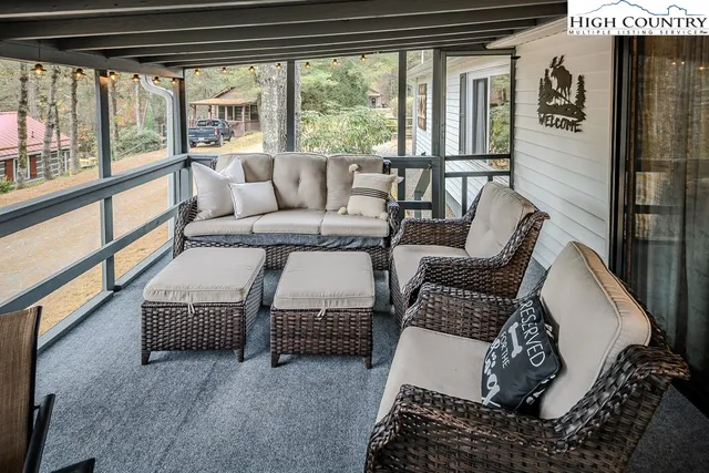 a bedroom with a bed and lamp