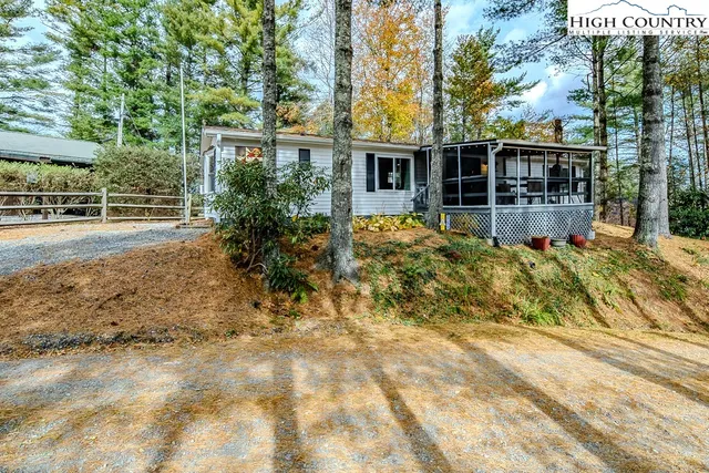a backyard of a house with seating space