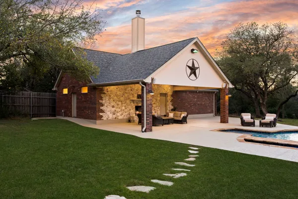 a outdoor living space with furniture and garden view