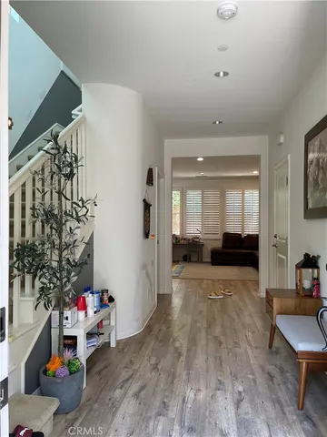a view of livingroom with furniture and wooden floor
