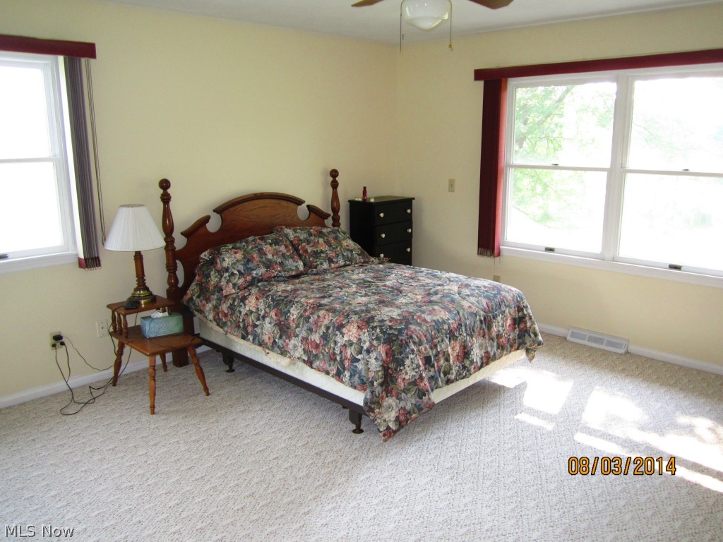 1891 Lafevre Road Geneva, OH 44041 - Photo 18 of 21 Another view of the bright Master Bedroom with large window view.