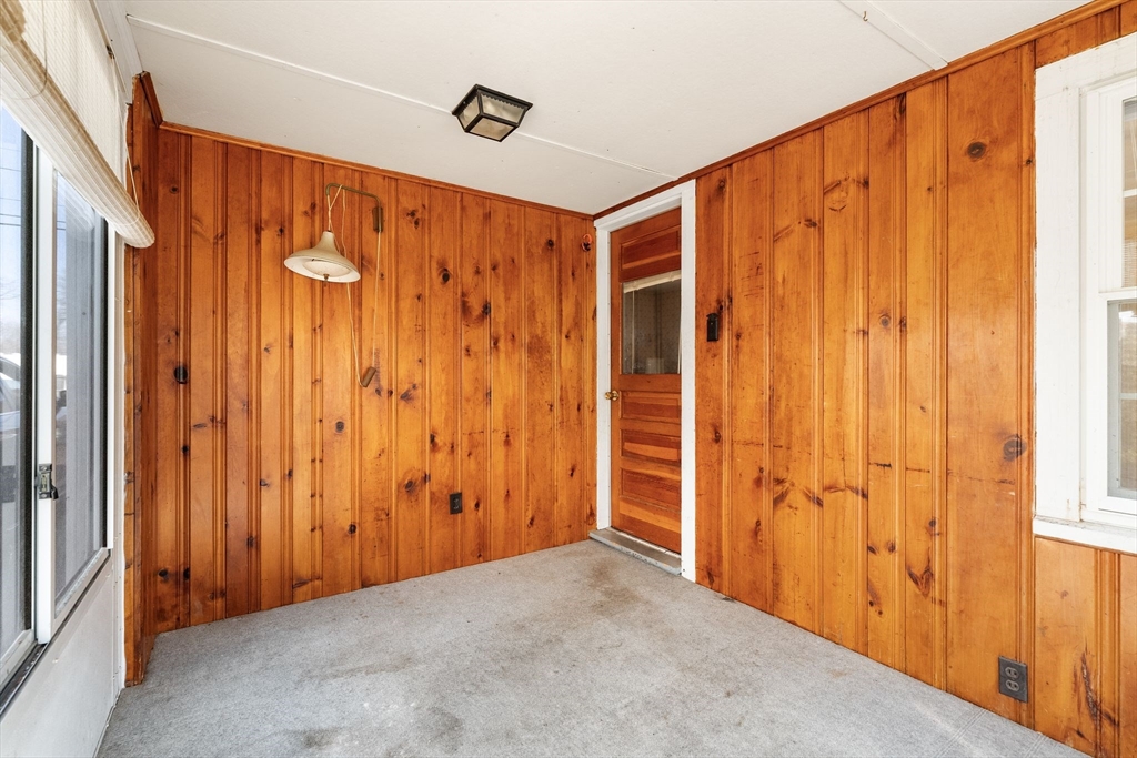 14 Hillside Road Braintree, MA 02184 - Photo 11 of 42 a view of a door with wooden walls