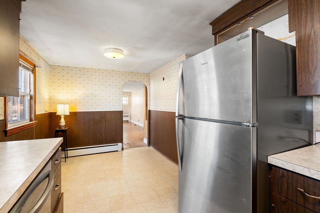 14 Hillside Road Braintree, MA 02184 - Photo 16 of 42 a kitchen with stainless steel appliances a refrigerator and a stove