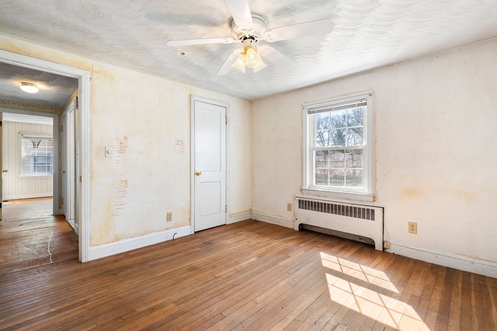 14 Hillside Road Braintree, MA 02184 - Photo 22 of 42 wooden floor in an empty room with a window