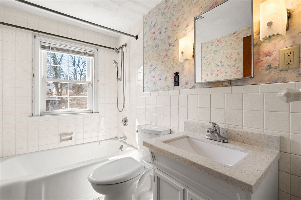 14 Hillside Road Braintree, MA 02184 - Photo 23 of 42 a bathroom with a sink and a toilet