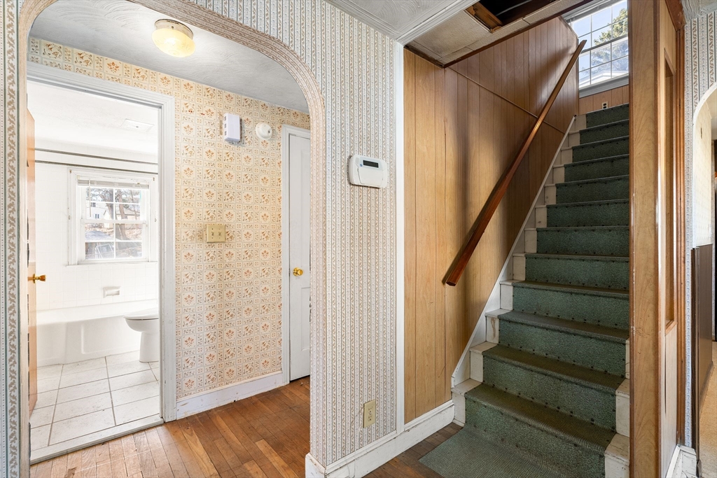 14 Hillside Road Braintree, MA 02184 - Photo 24 of 42 a view of a hallway with wooden floor and entryway