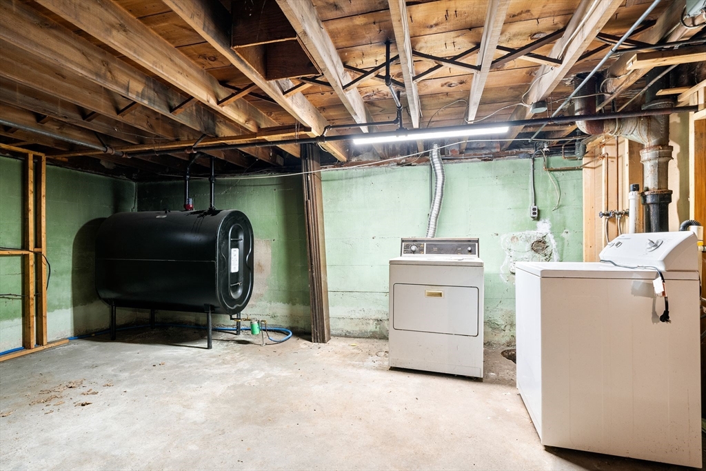 14 Hillside Road Braintree, MA 02184 - Photo 32 of 42 a view of a storage & utility room with washer and dryer