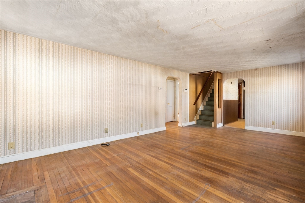 14 Hillside Road Braintree, MA 02184 - Photo 7 of 42 a view of an empty room with wooden floor
