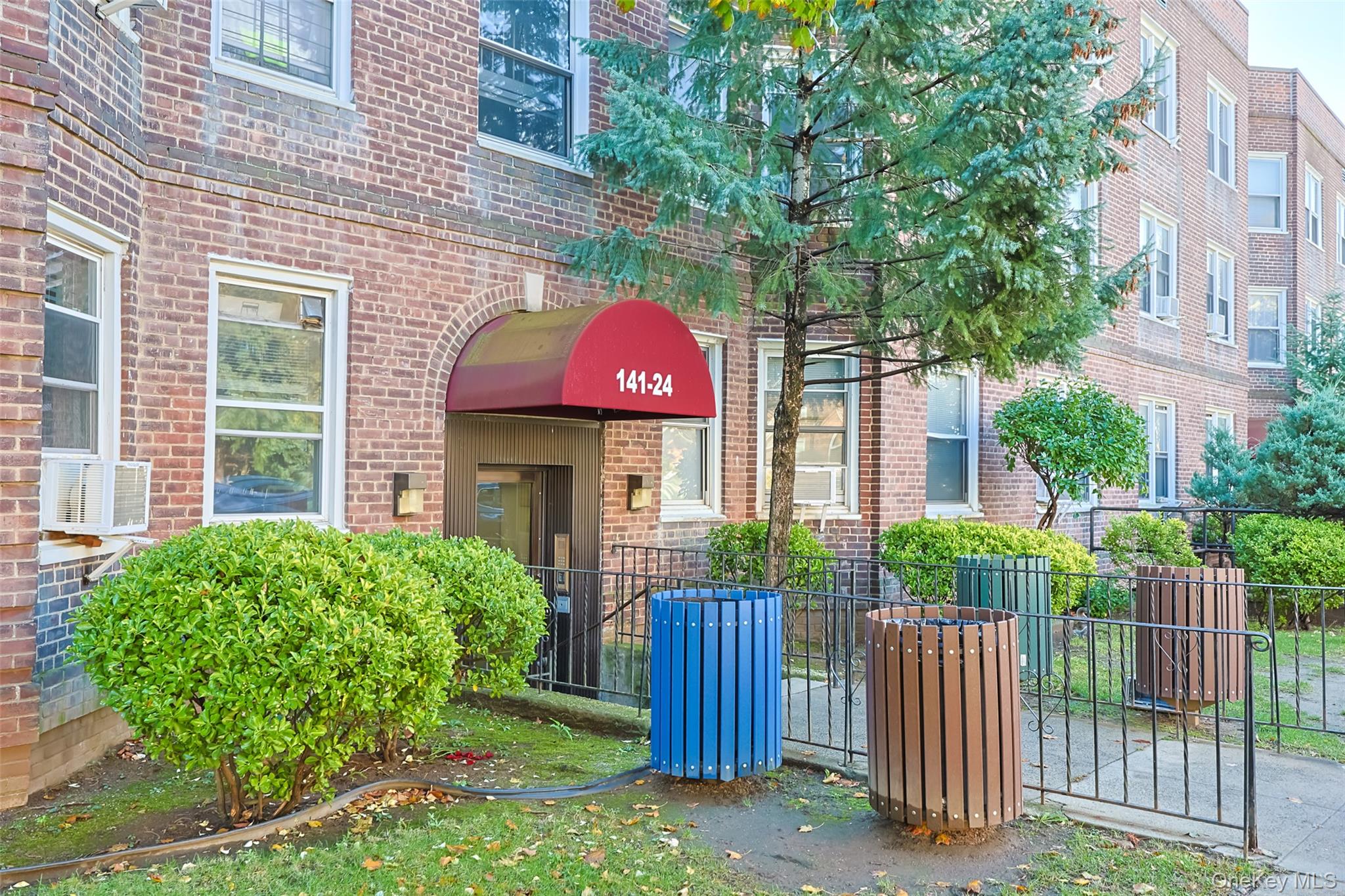 141-24 78th Road, Unit 3A Queens, NY 11367 - Photo 15 of 15 a view of a house with a yard and plants