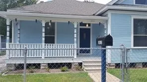a view of a deck with a fence