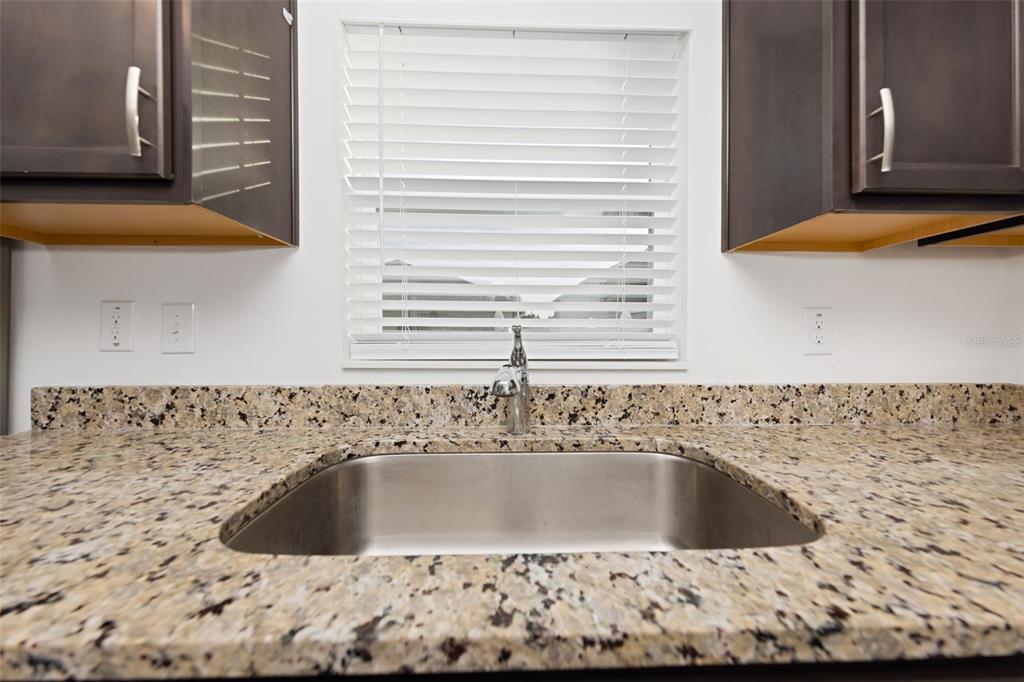 8646 Pinetop Ridge Lane Brooksville, FL 34613 - Photo 12 of 76 a bathroom with a bathtub and a sink