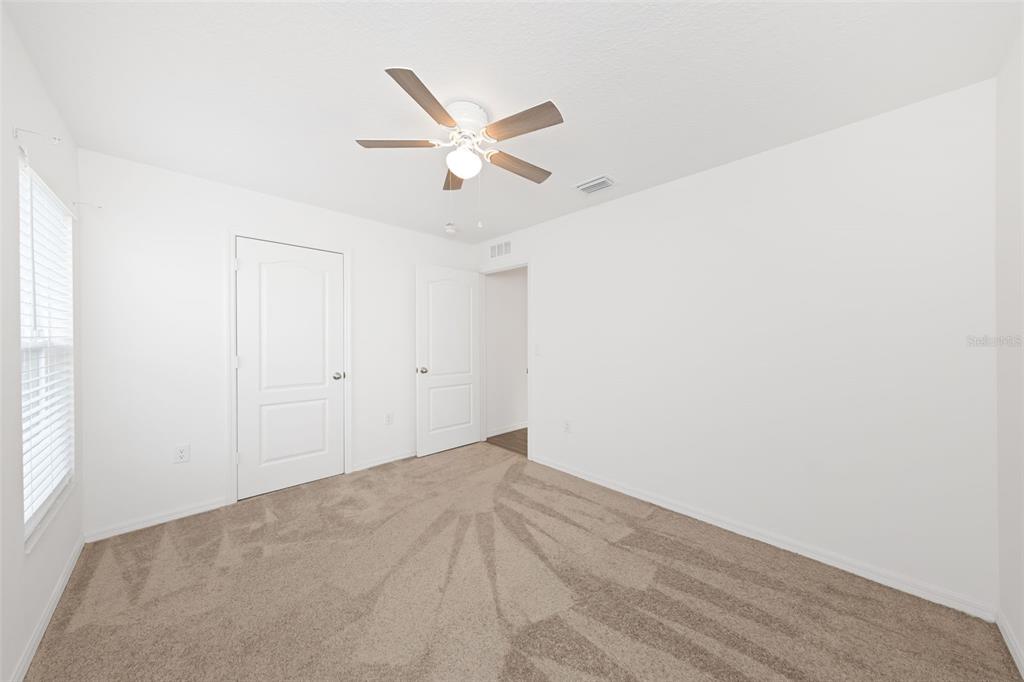 8646 Pinetop Ridge Lane Brooksville, FL 34613 - Photo 29 of 76 a view of a big room with wooden floor
